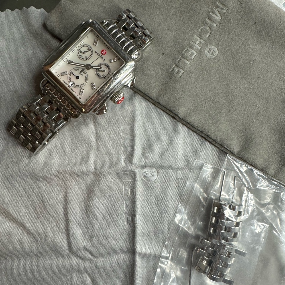 Silver Michelle Watch with dust bag, cloth and extra links